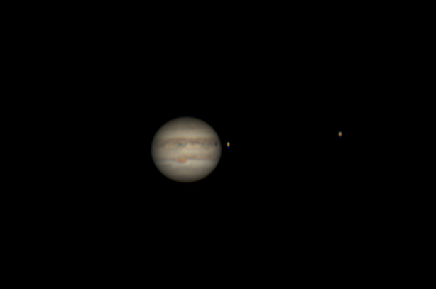 Jupiter during moon shadow transit by Claudio Oriani